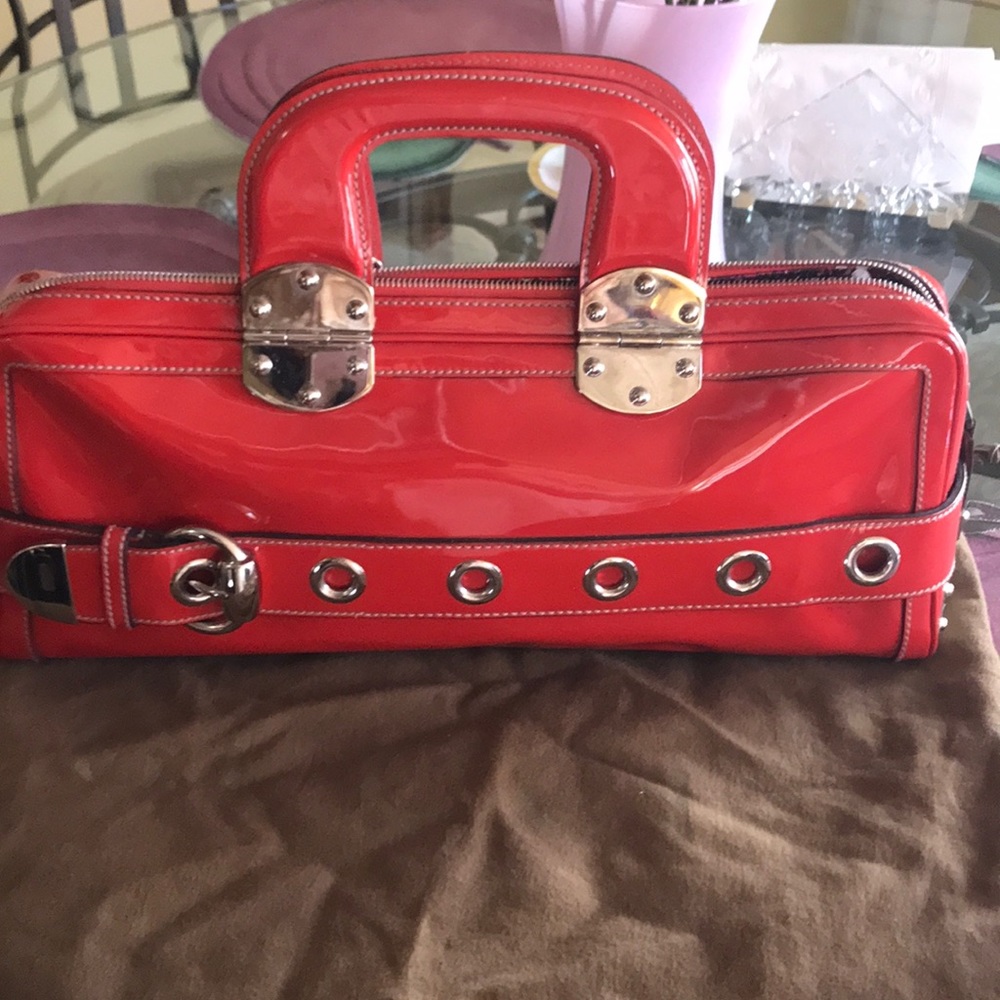 Gucci Romy red patent handbag.